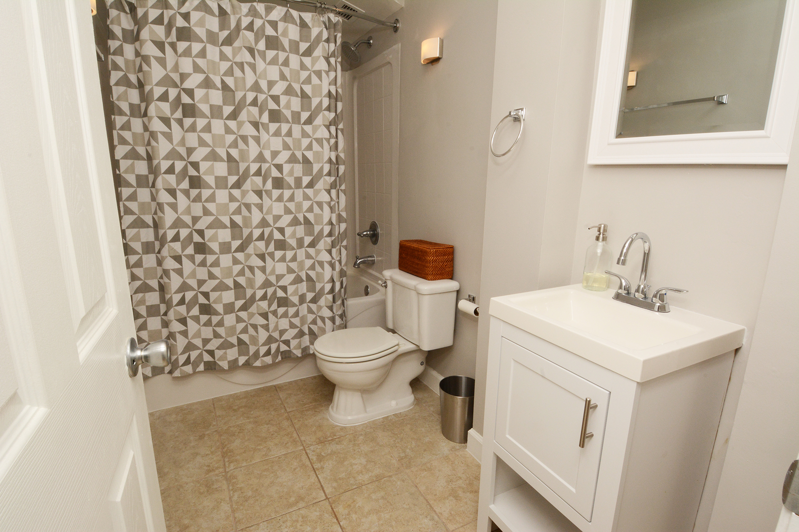 6007 North Sheridan Road, Unit 23D Chicago, IL 60660 - Photo 14 of 22 a white toilet sitting next to a bathroom sink