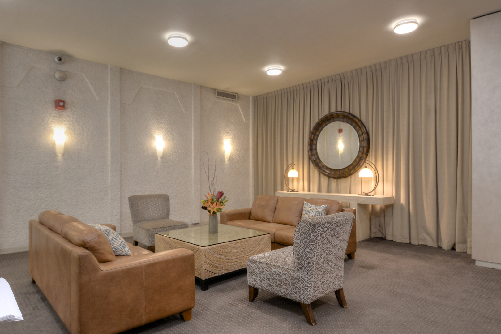 6007 North Sheridan Road, Unit 23D Chicago, IL 60660 - Photo 18 of 22 a living room with furniture and a mirror