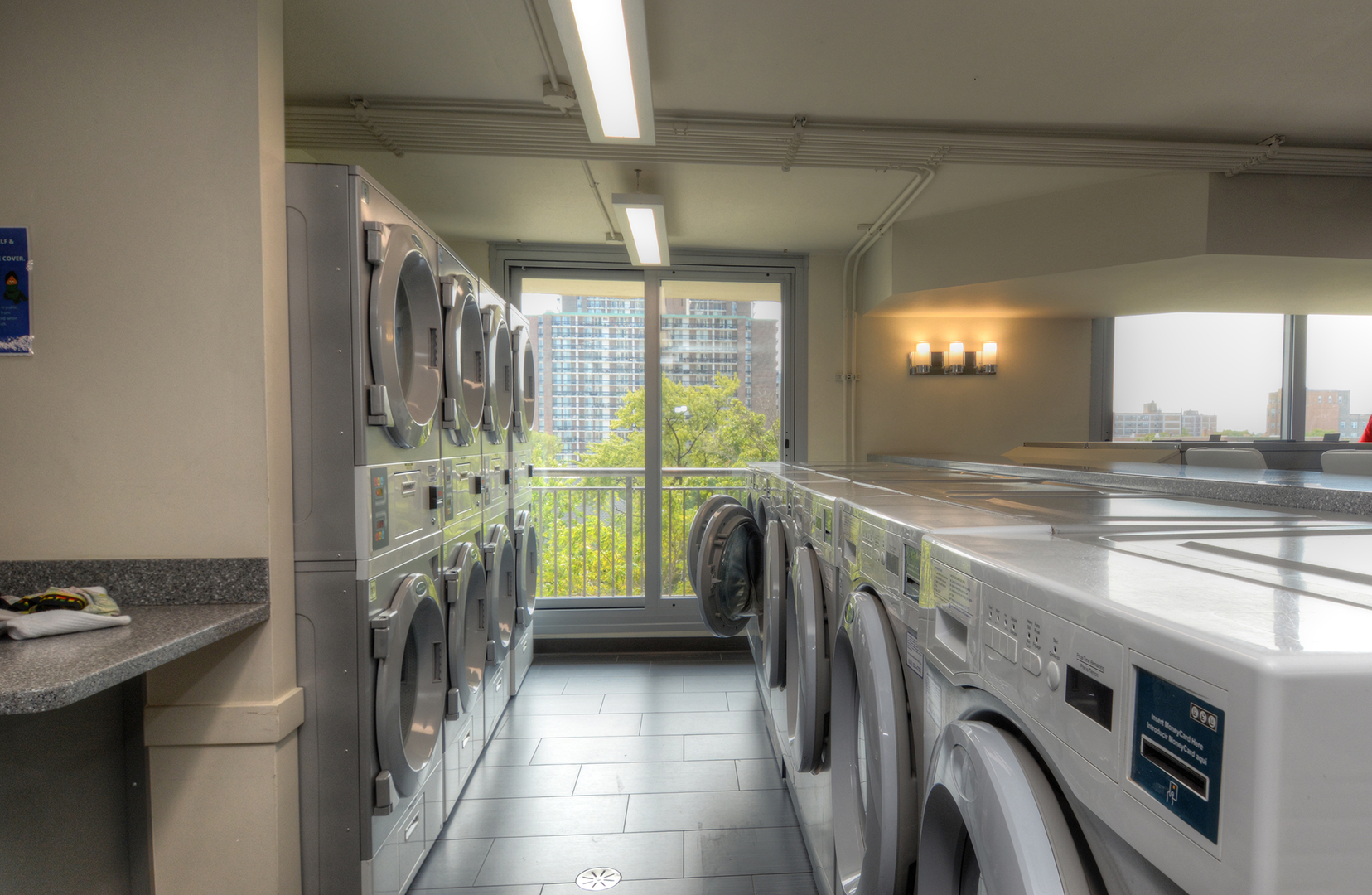 6007 North Sheridan Road, Unit 23D Chicago, IL 60660 - Photo 21 of 22 a utility room with dryer and washer