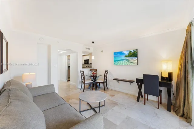 a view of a livingroom with furniture and a couch