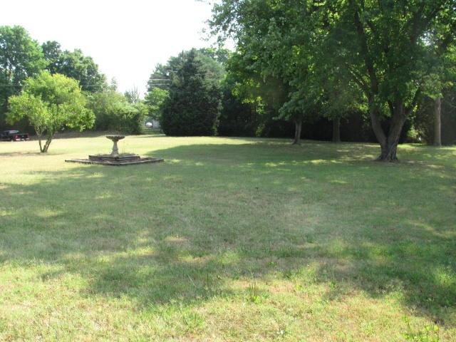 105 Adams Loop Tennessee Ridge, TN 37178 - Photo 3 of 20 a view of a garden with trees