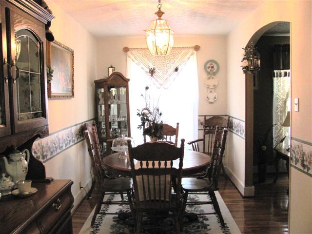 105 Adams Loop Tennessee Ridge, TN 37178 - Photo 10 of 20 a view of a dining room with furniture and chandelier