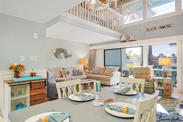 a living room with furniture and a couch