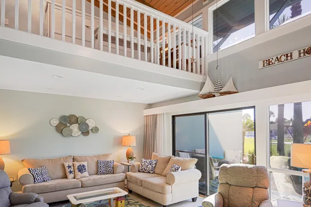 a view of a living room with furniture