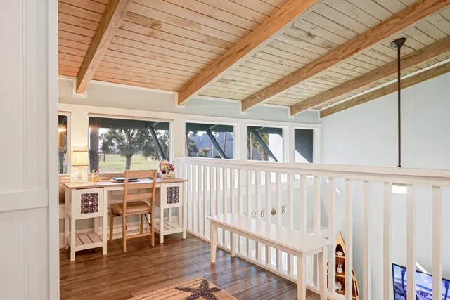 a room with a table and chairs