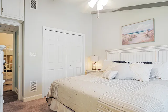 a bathroom with a granite countertop toilet sink and shower