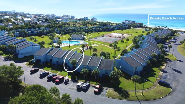 a kitchen with stainless steel appliances granite countertop a refrigerator a stove a sink dishwasher and a refrigerator with wooden floor