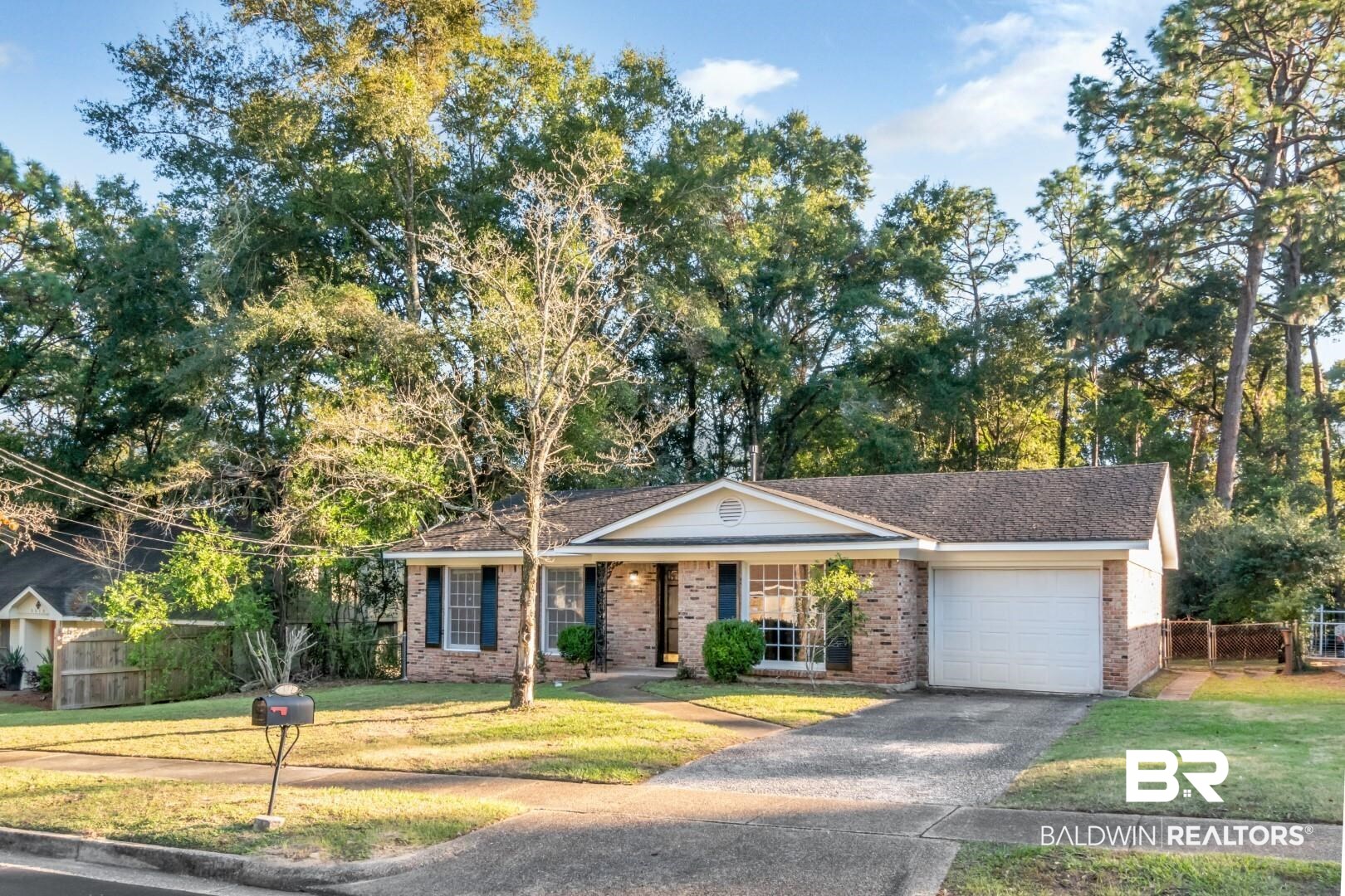 5517 Vanderbilt Drive Mobile, AL 36608 - Photo 1 of 33 Single story home with a front yard and a garage
