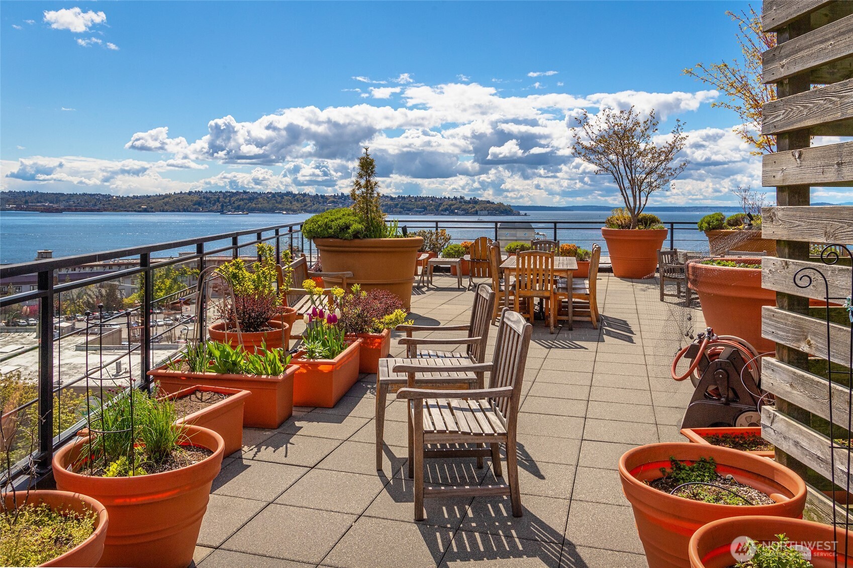 2607 Western Avenue, Unit 452 Seattle, WA 98121 - Photo 13 of 26 a view of a chairs and table in the patio