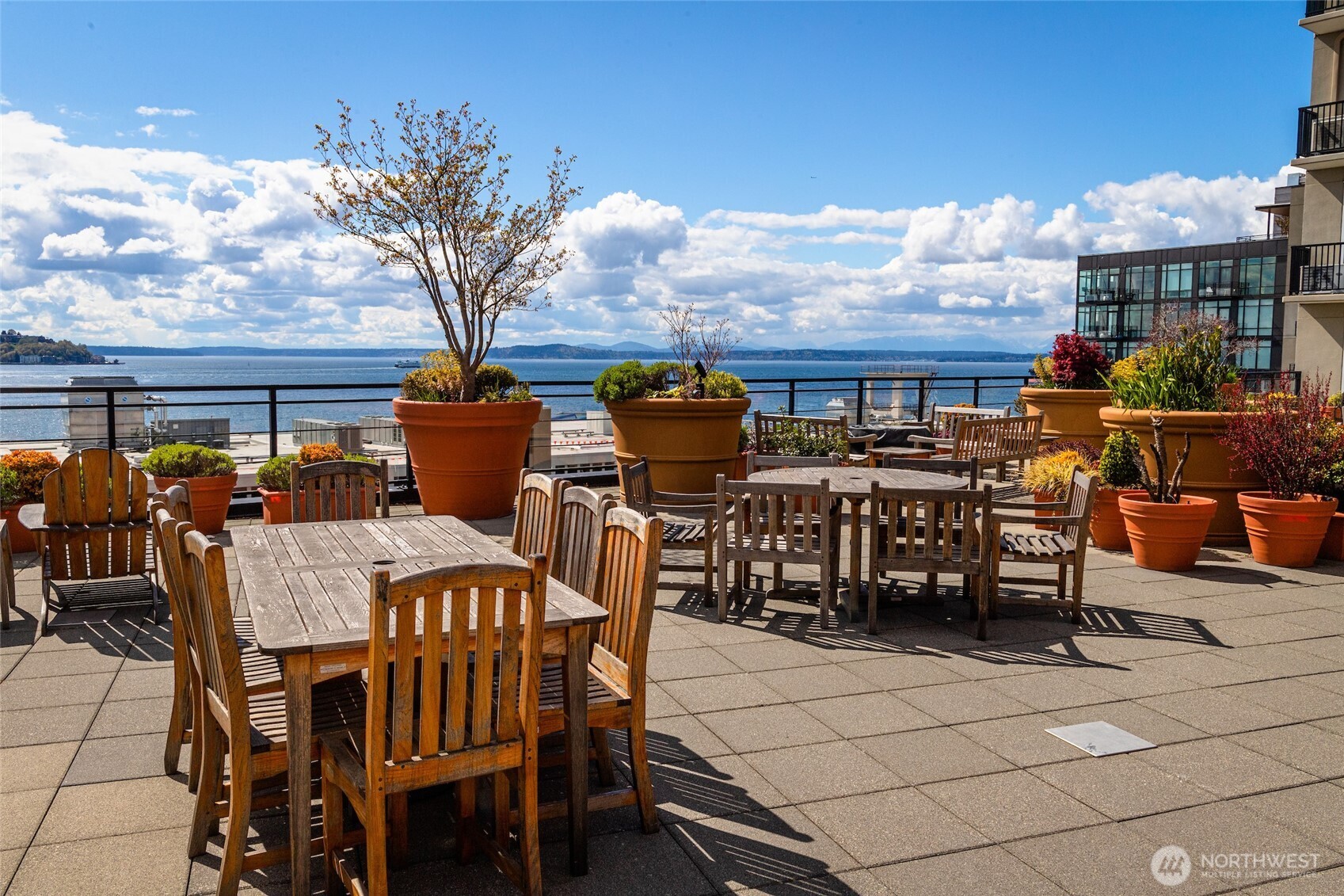 2607 Western Avenue, Unit 452 Seattle, WA 98121 - Photo 17 of 26 a view of a terrace with furniture and stove