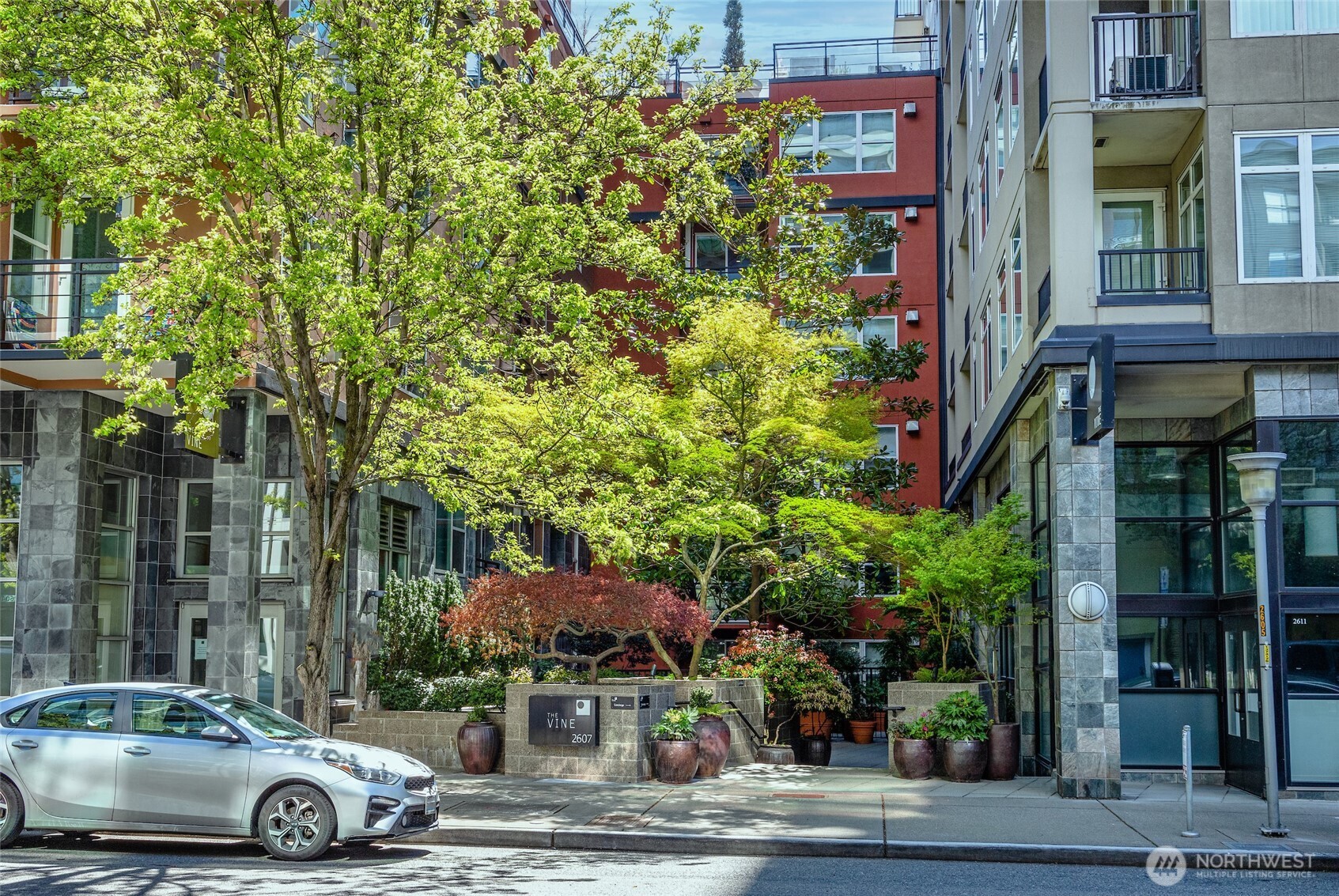 2607 Western Avenue, Unit 452 Seattle, WA 98121 - Photo 21 of 25 a car parked in front of a building