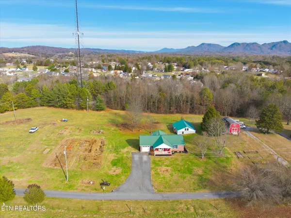 $499,900 | 411 Meadow Breeze Road, Corryton, TN 37721
