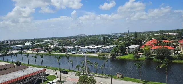 a view of a lake with a house