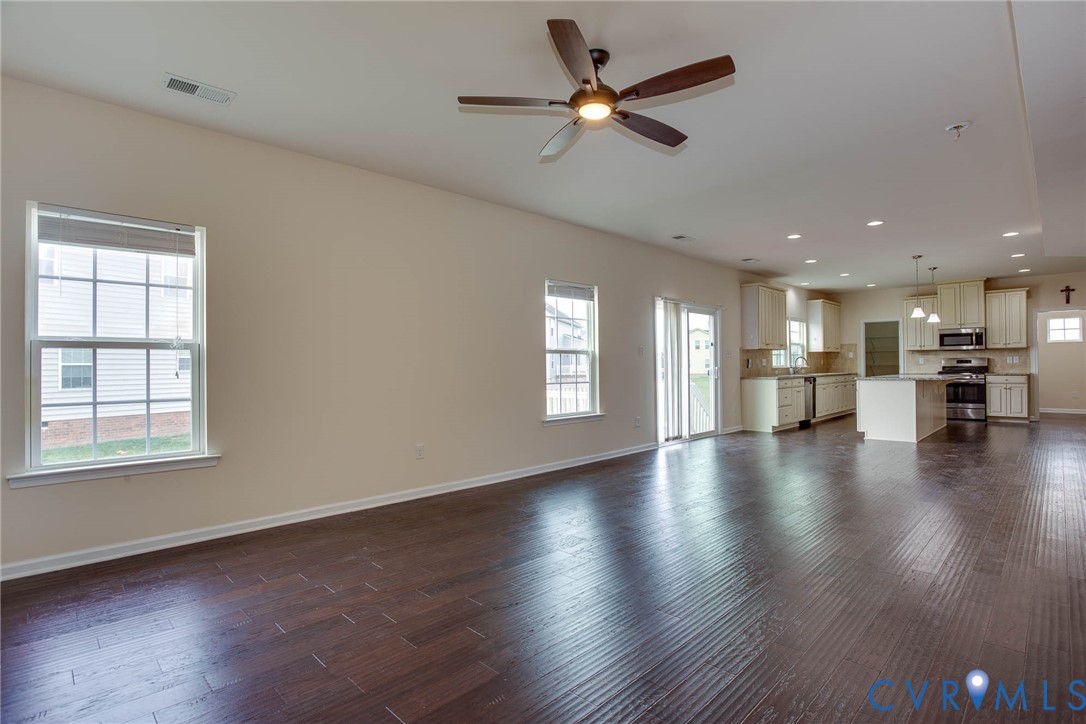 12219 Almer Lane Chester, VA 23836 - Photo 20 of 46 a view of empty room with wooden floor and window