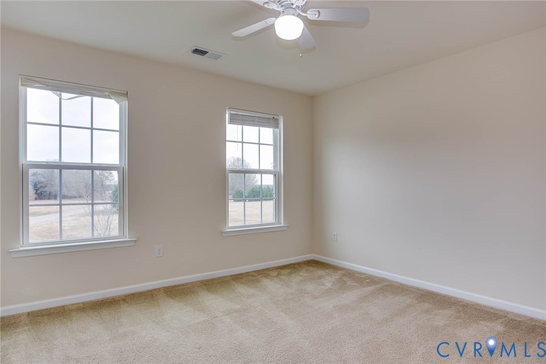 12219 Almer Lane Chester, VA 23836 - Photo 35 of 46 an empty room with windows