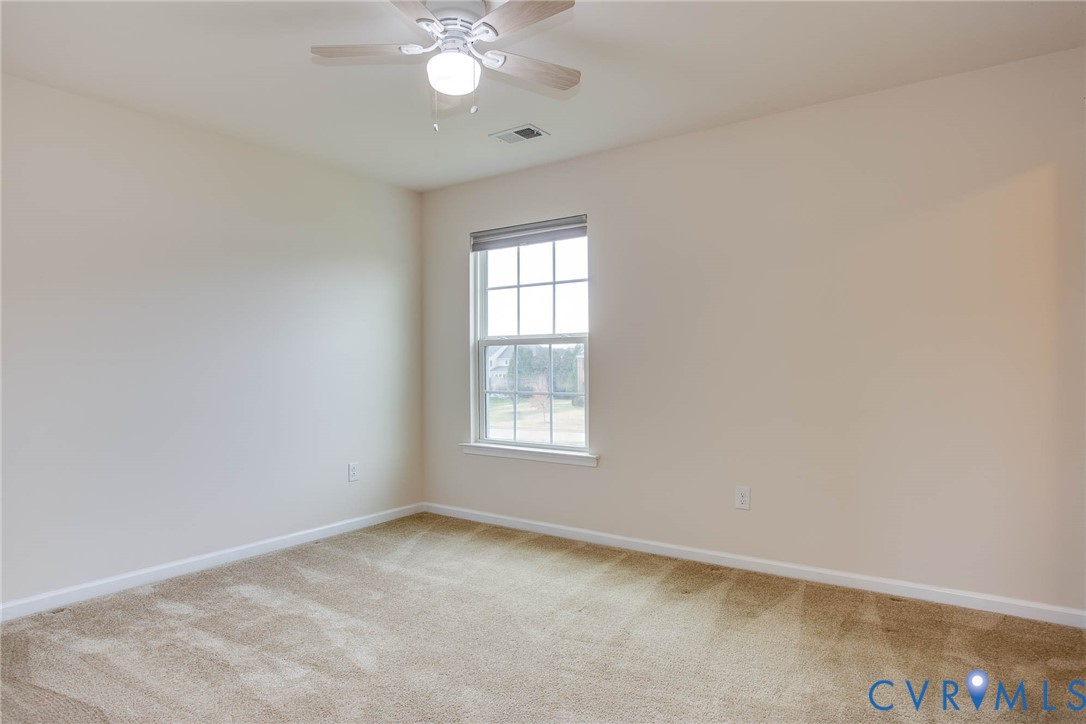 12219 Almer Lane Chester, VA 23836 - Photo 39 of 46 an empty room with a window