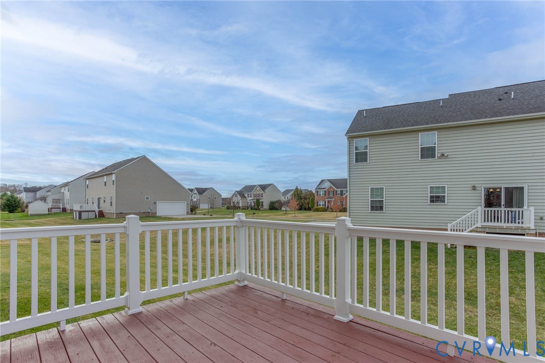 12219 Almer Lane Chester, VA 23836 - Photo 43 of 46 a view of a wooden roof deck