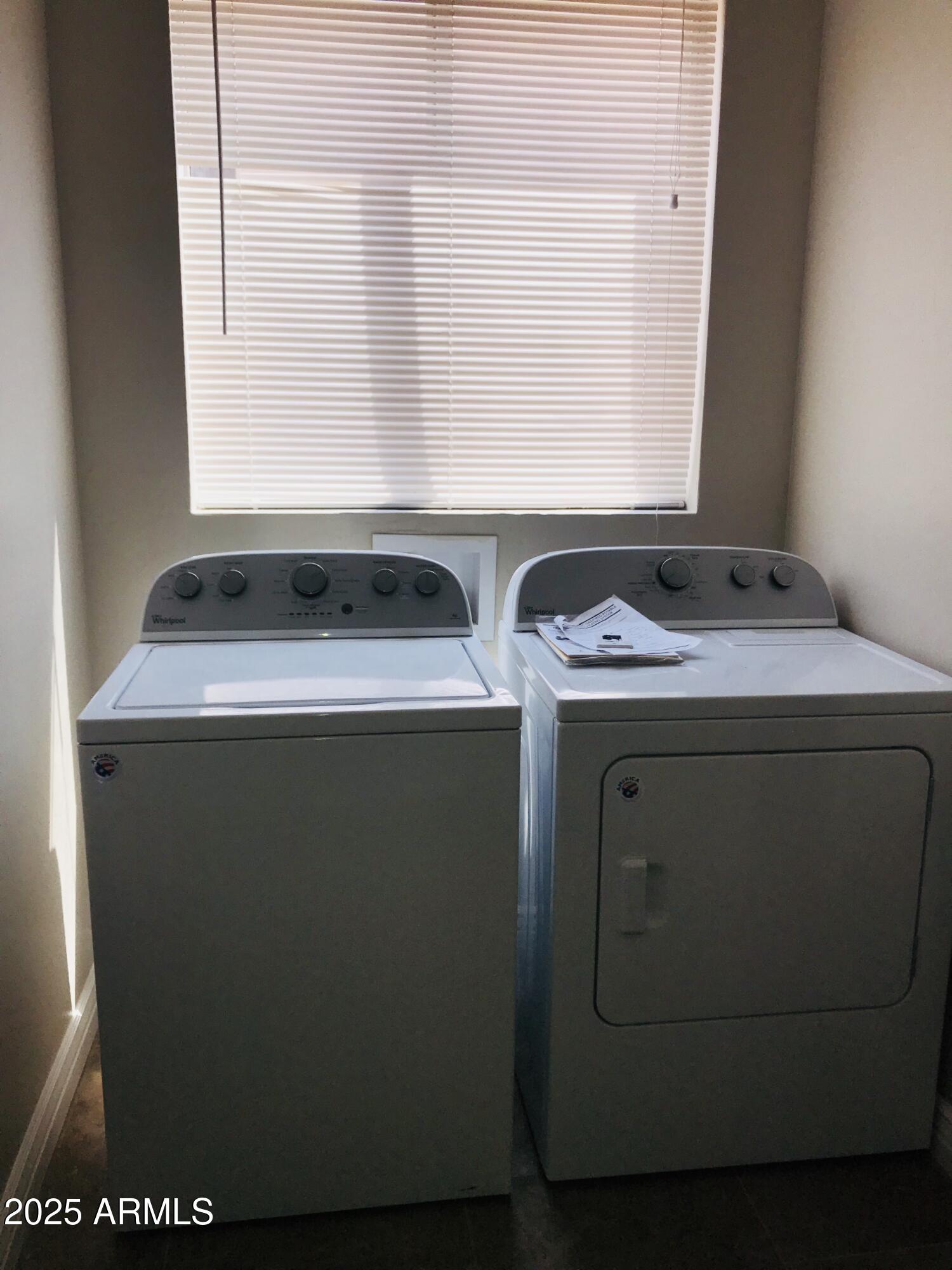 3670 South Heath Way Chandler, AZ 85248 - Photo 14 of 29 a utility room with dryer and washer