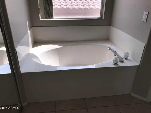 a view of a bathtub in a bathroom