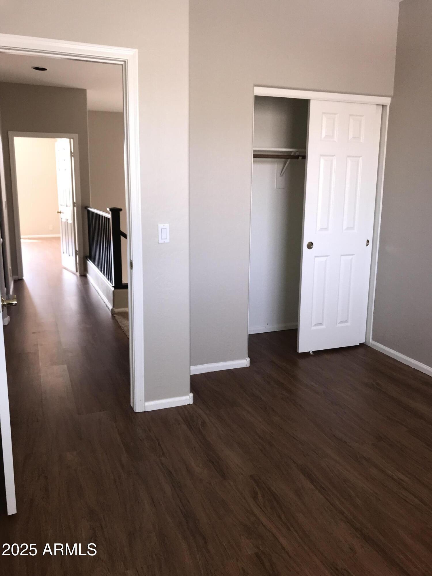 3670 South Heath Way Chandler, AZ 85248 - Photo 23 of 29 a view of a hallway with wooden floor