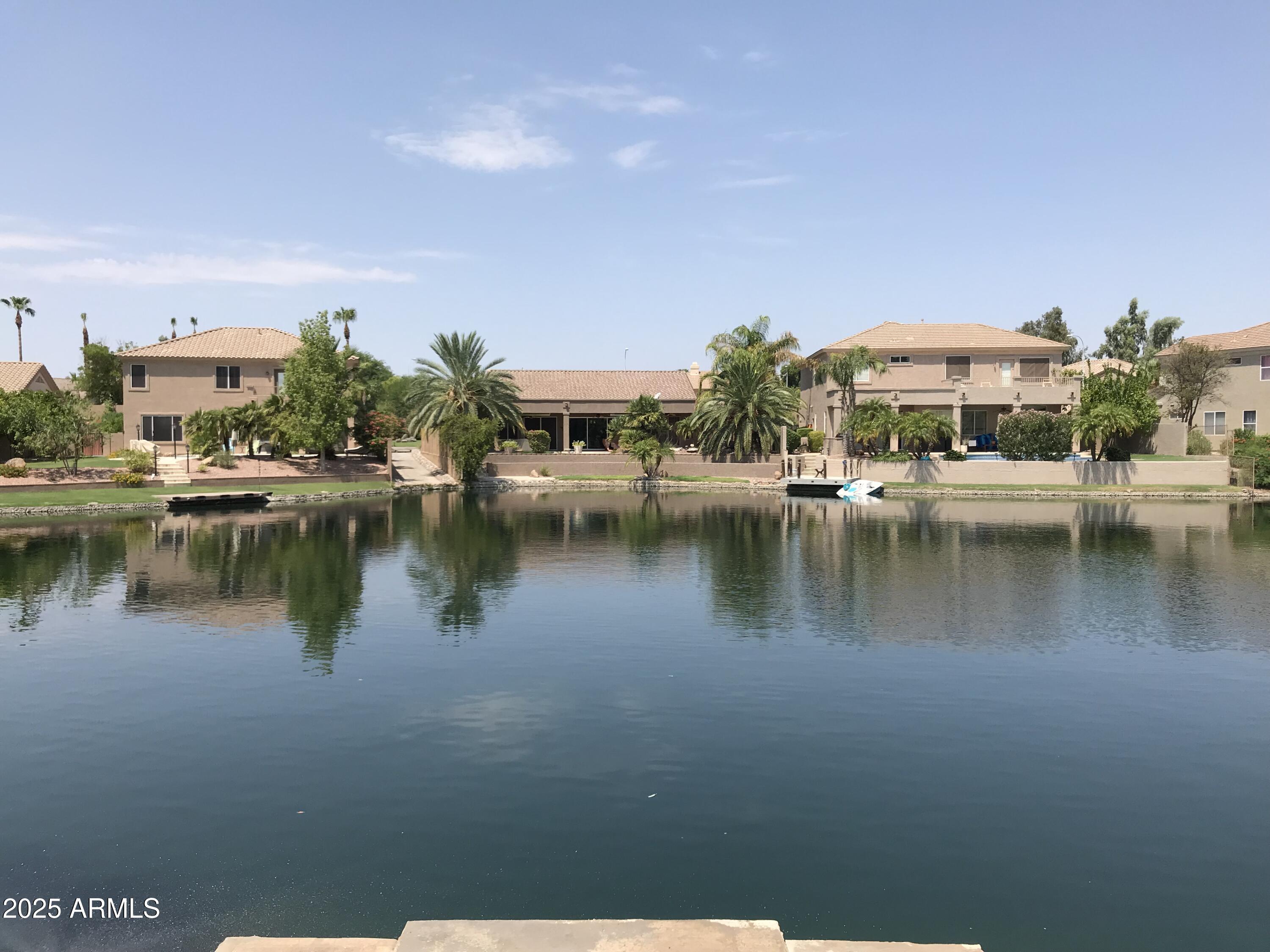 3670 South Heath Way Chandler, AZ 85248 - Photo 28 of 29 a view of a lake with houses