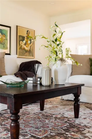 a living room with a couch and a table