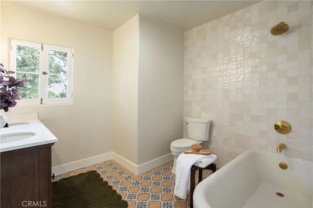 a view of a chair and table in the terrace