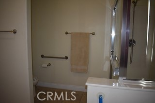 1746 Dalea Way Beaumont, CA 92223 - Photo 15 of 35 a bathroom with a sink and a mirror