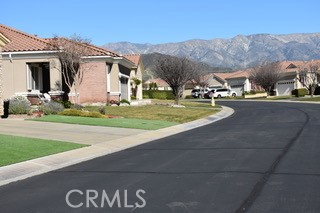 1746 Dalea Way Beaumont, CA 92223 - Photo 2 of 35 a view of a house with a yard