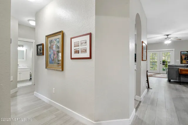 a view of walk in closet with clothes