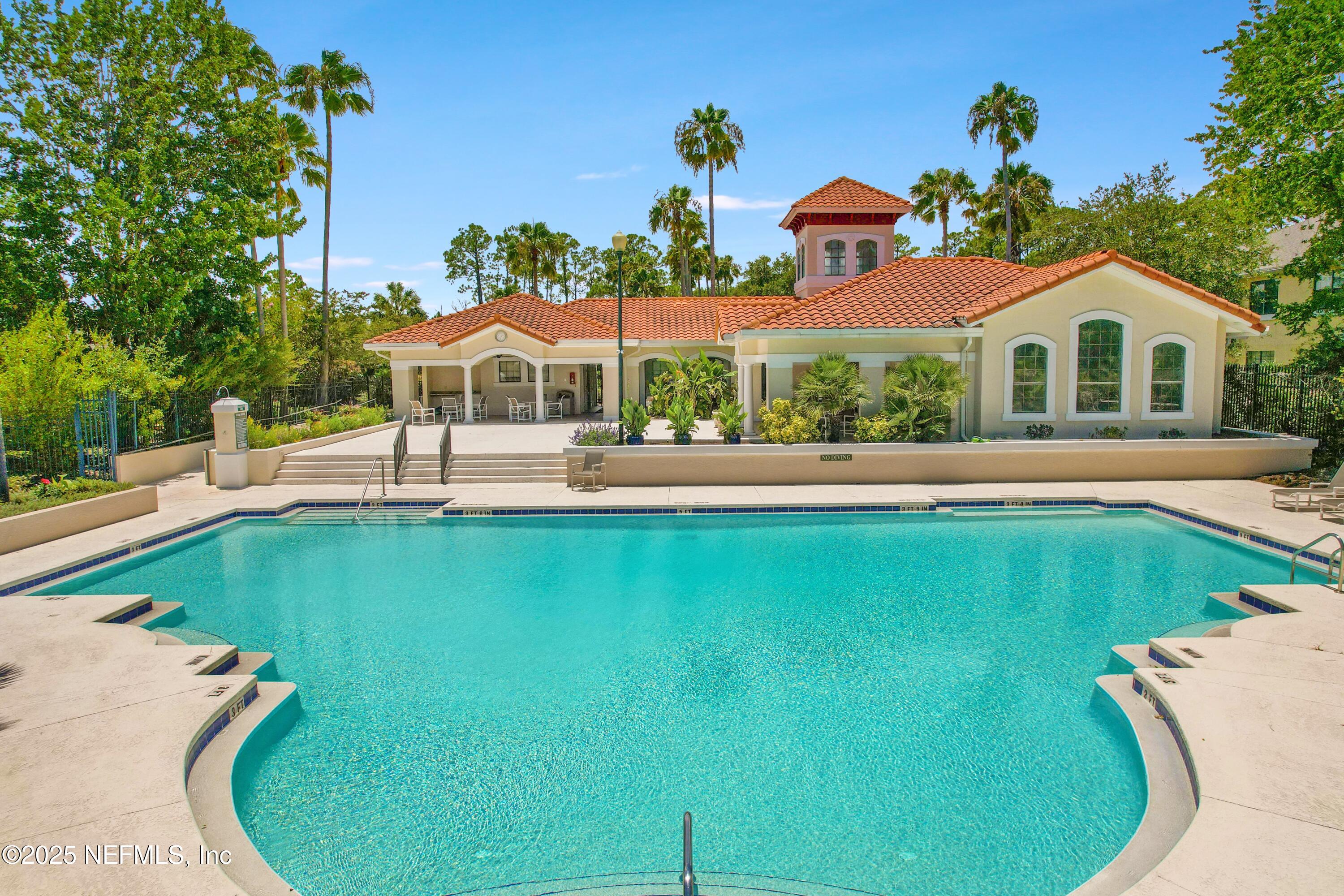 1125 Vista Cove Road St. Augustine, FL 32084 - Photo 3 of 62 a front view of a house with a yard