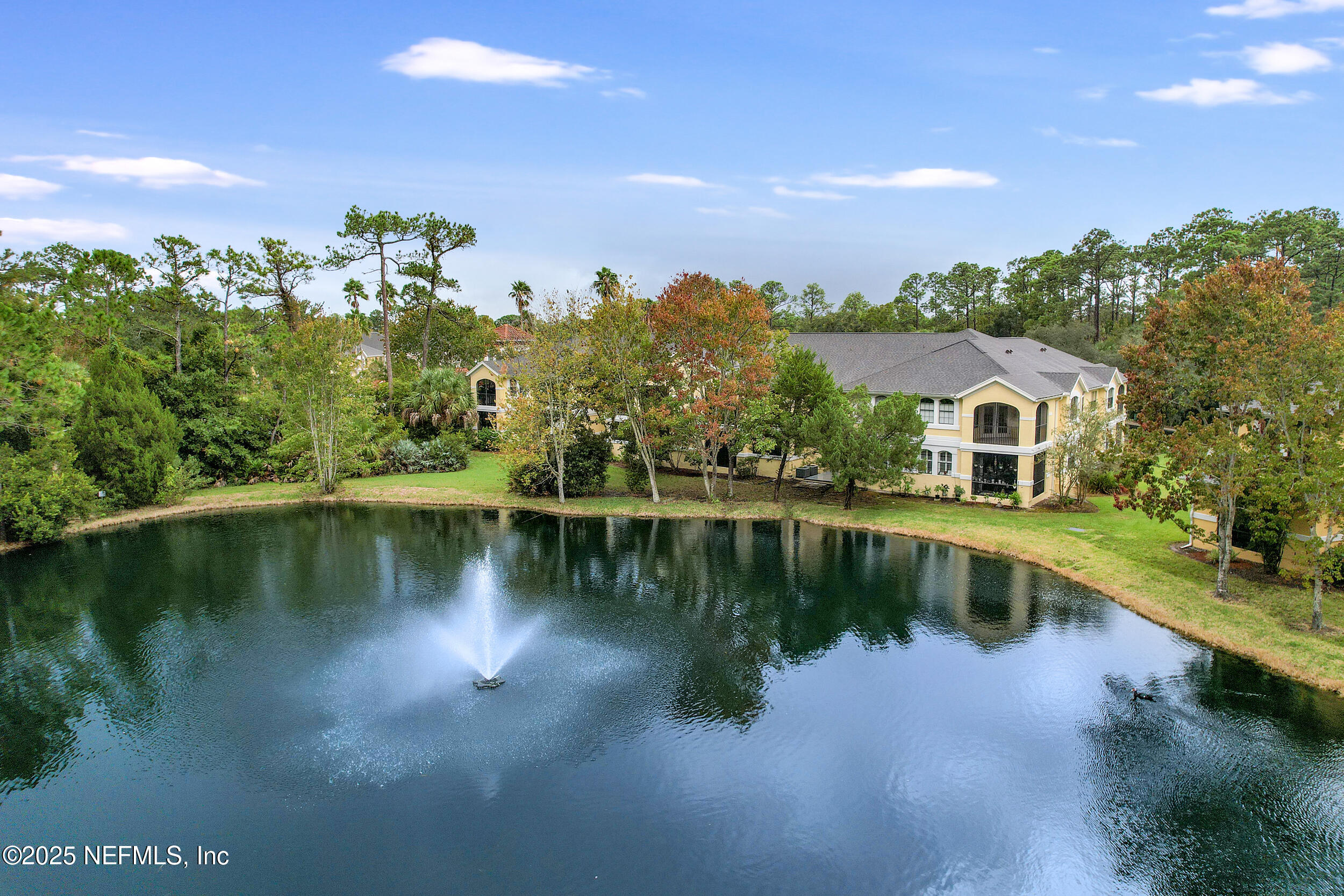 1125 Vista Cove Road St. Augustine, FL 32084 - Photo 39 of 62 a view of a lake with a house in the background