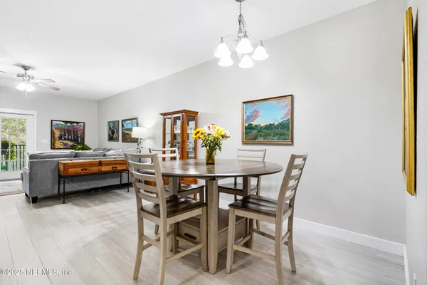 a kitchen with stainless steel appliances a stove a sink and a microwave