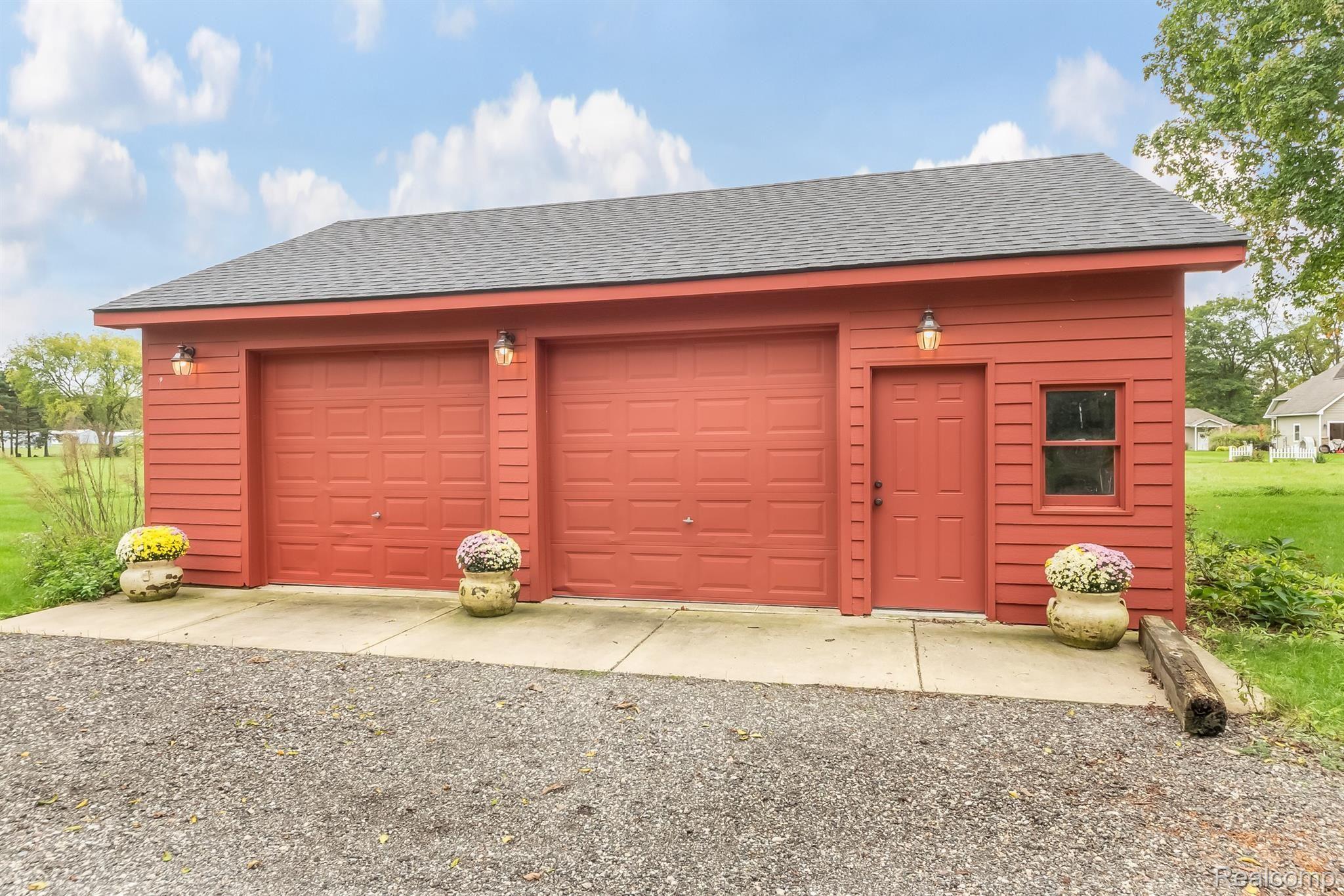 8480 Hyne Road Brighton, MI 48114 - Photo 28 of 50 32 x 24 garage provides room for 2 cars, plus additional space