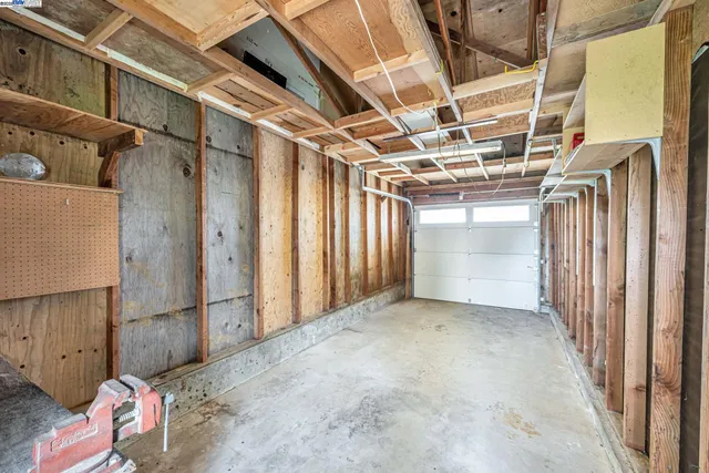 a view of a room with a garage
