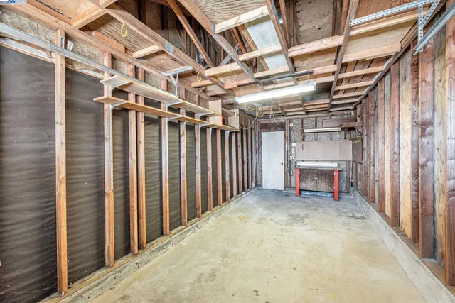 a view of a chairs and table in the patio