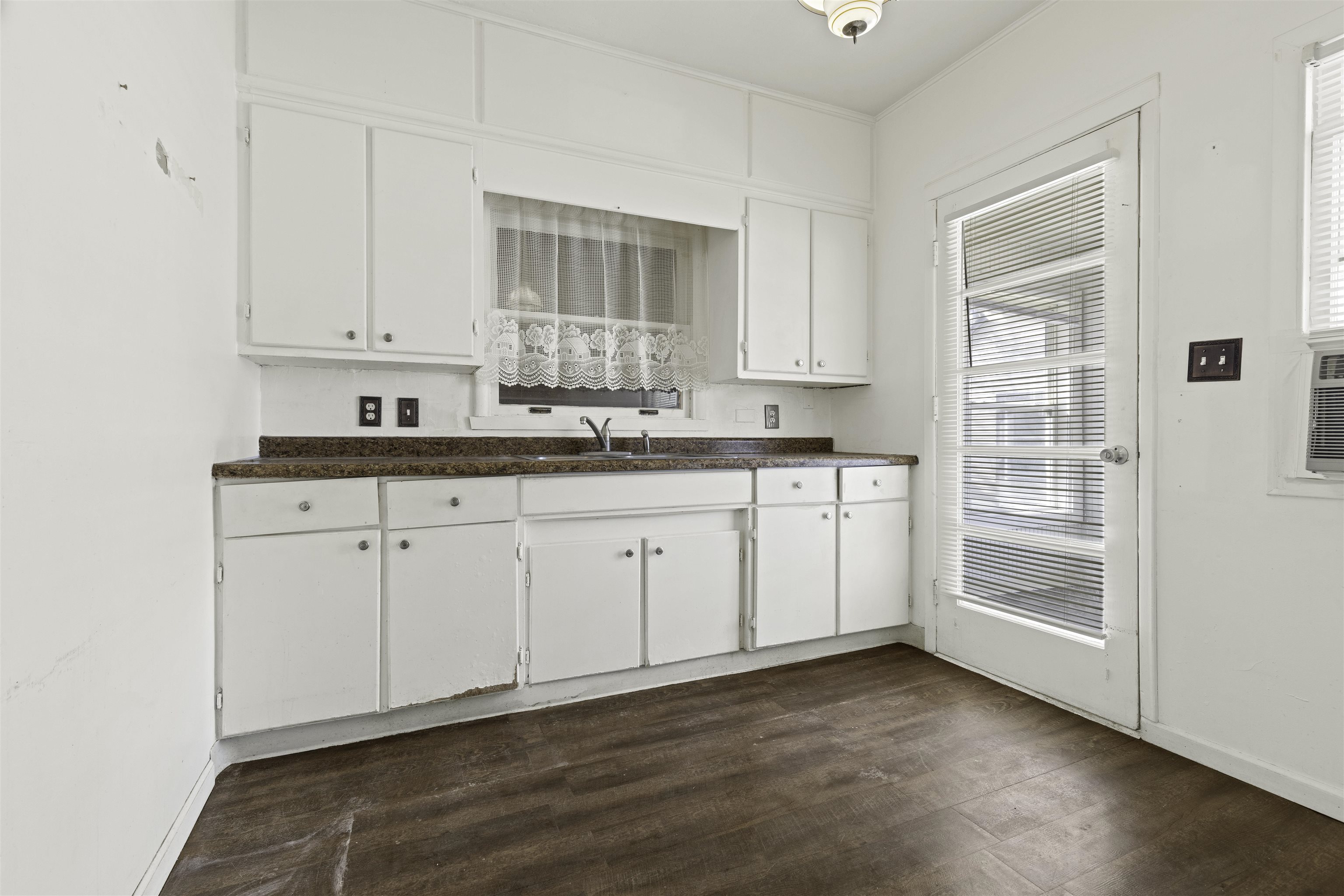 5745 Park Ridge Road Loves Park, IL 61111 - Photo 7 of 16 a view of cabinets a sink and dishwasher in a kitchen