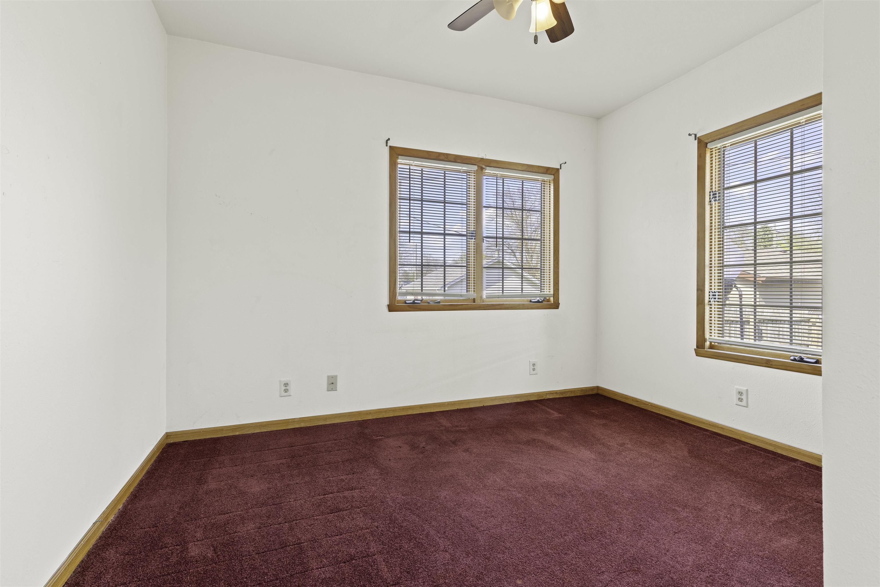 5745 Park Ridge Road Loves Park, IL 61111 - Photo 10 of 16 an empty room with windows