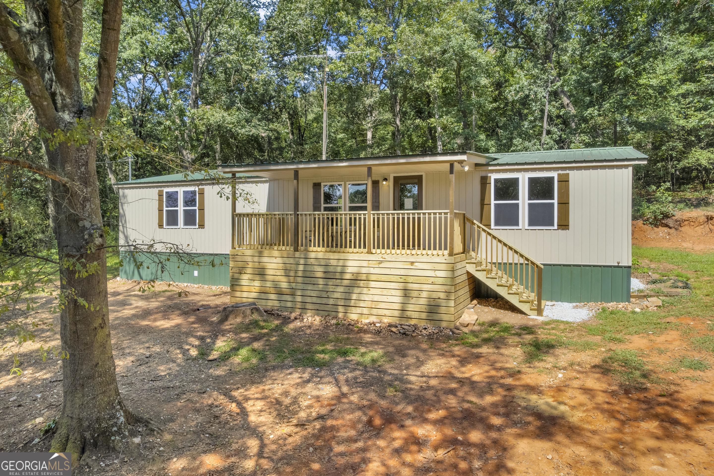 1679 Fort Lamar Road Commerce, GA 30530 - Photo 1 of 1 front view of a house with a yard