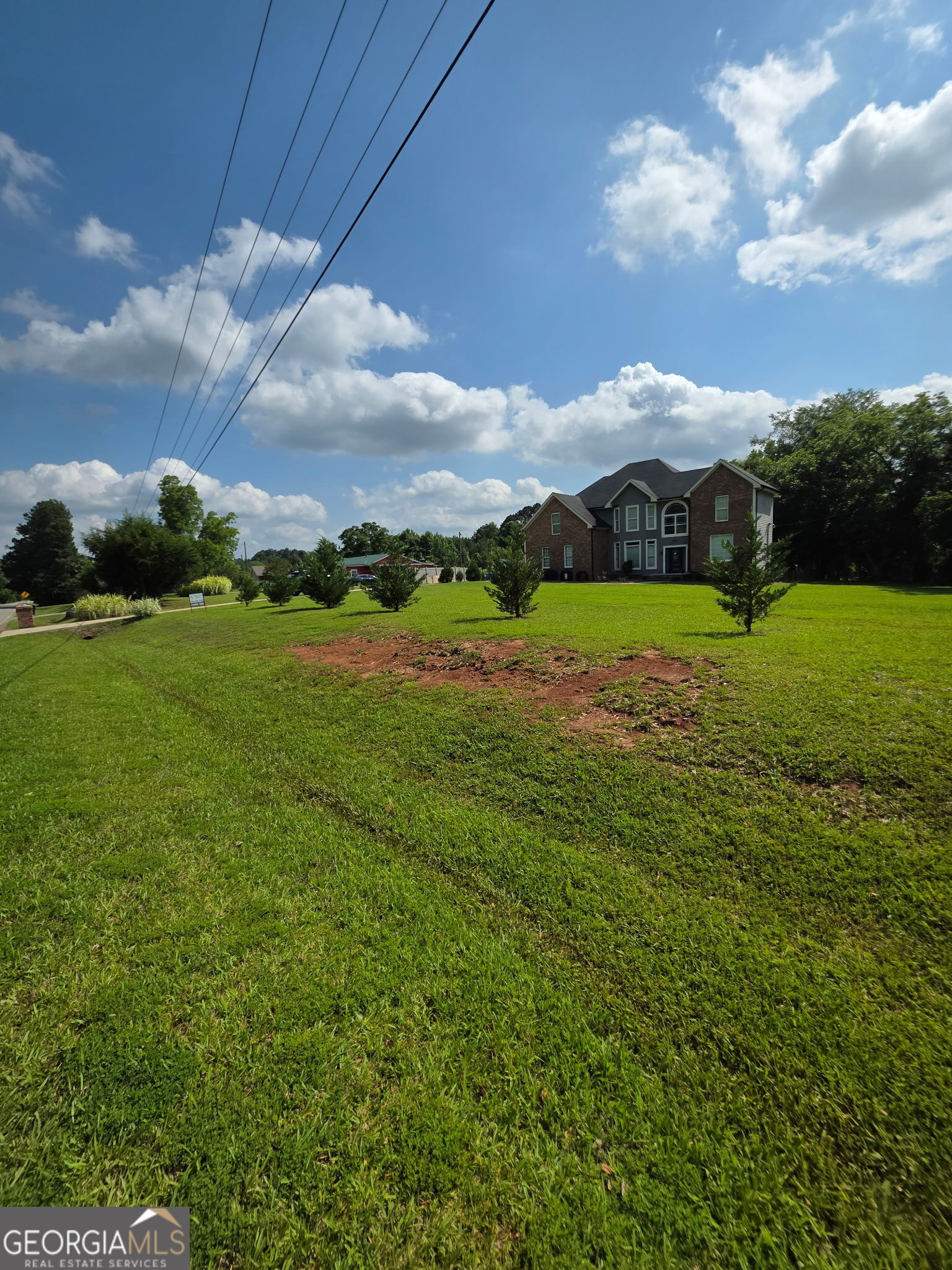 892 Perimeter Road Monticello, GA 31064 - Photo 38 of 38 a view of an ocean beach and mountain