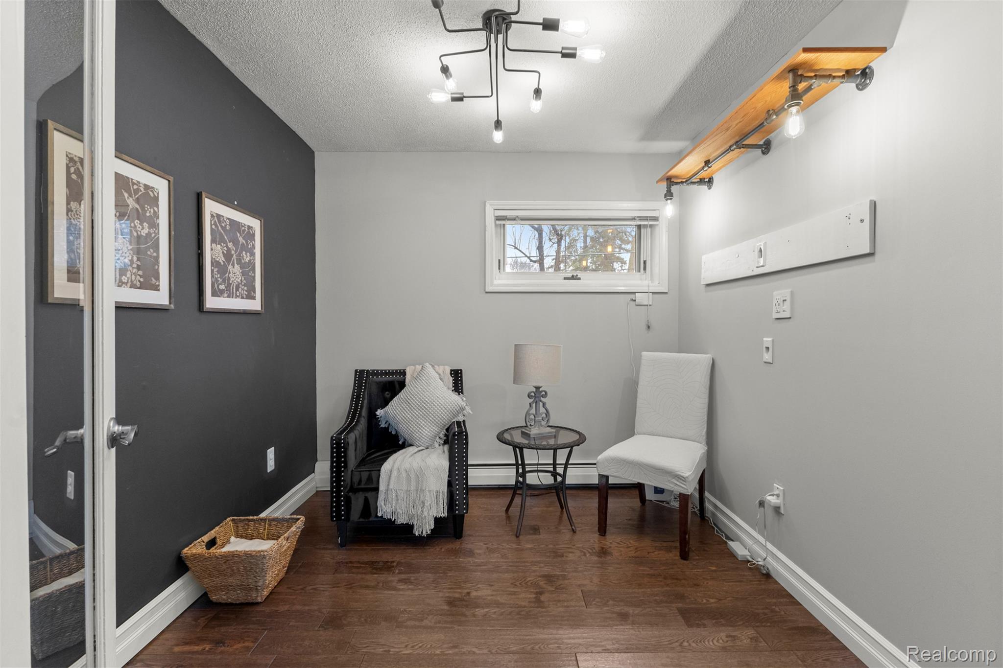 45401 West 9 Mile Road Novi, MI 48374 - Photo 15 of 67 Sitting room featuring dark wood-style floors, a textured ceiling, and baseboard heating