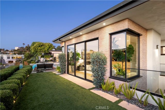 a house view with a garden space