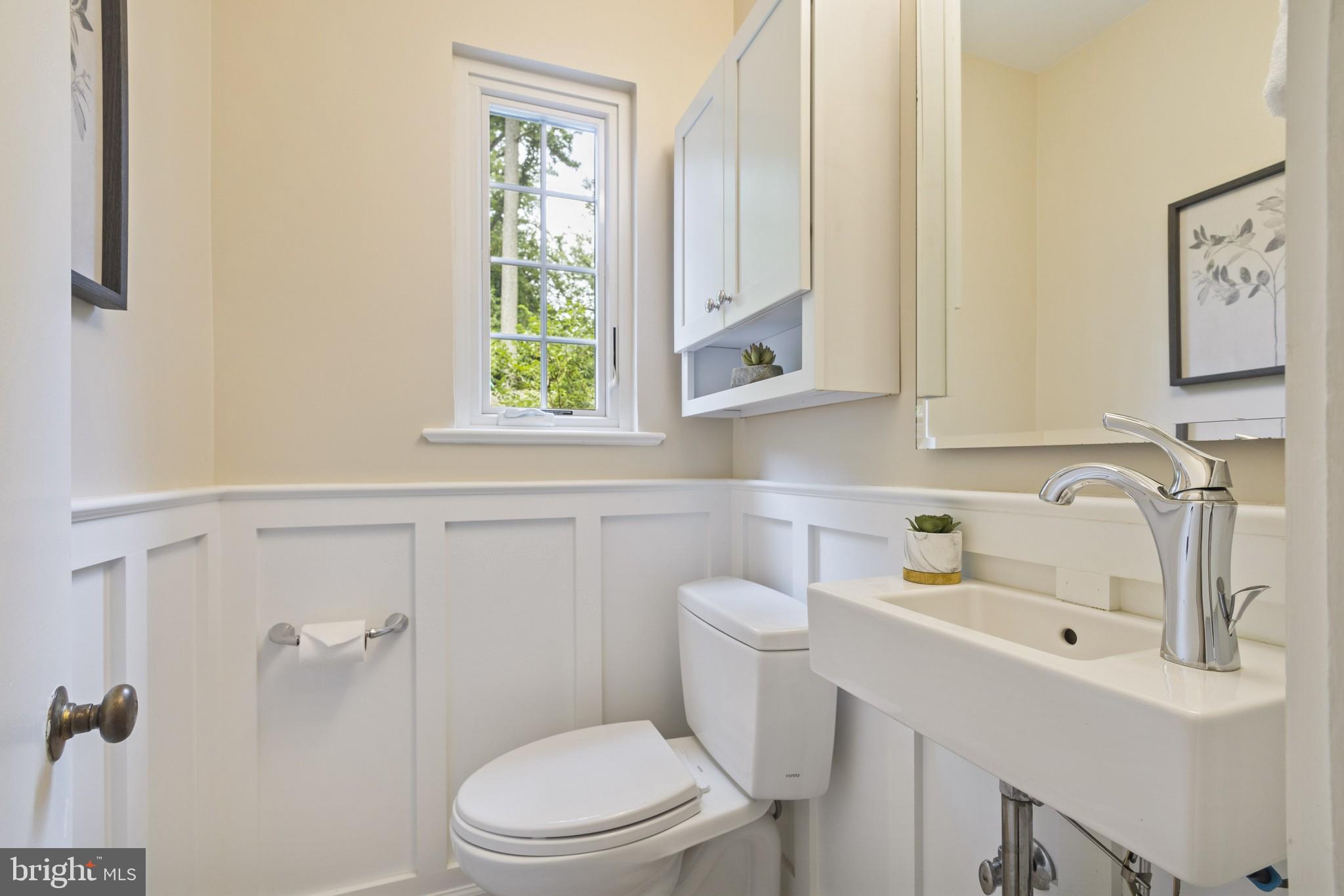 9314 Crosby Road Silver Spring, MD 20910 - Photo 12 of 34 Powder room off kitchen