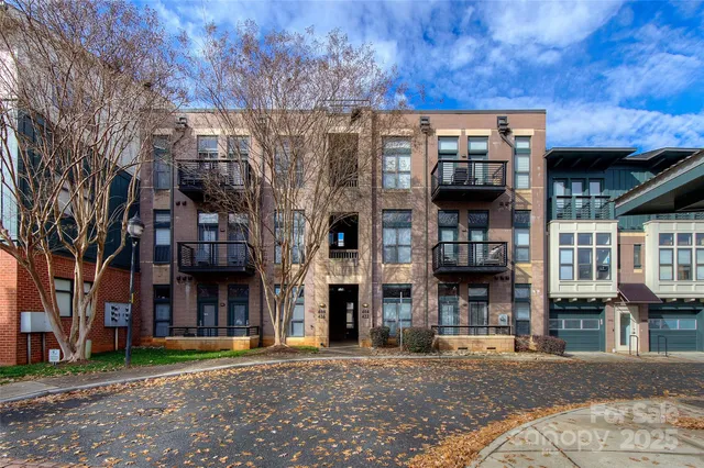 a view of a building with a street