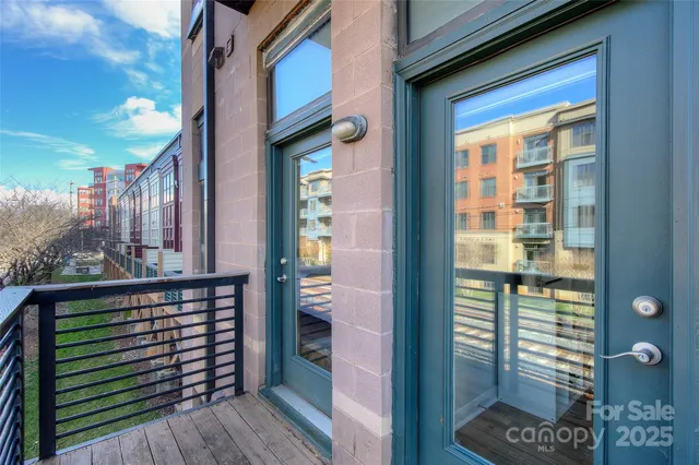 a view of a glass door of the house