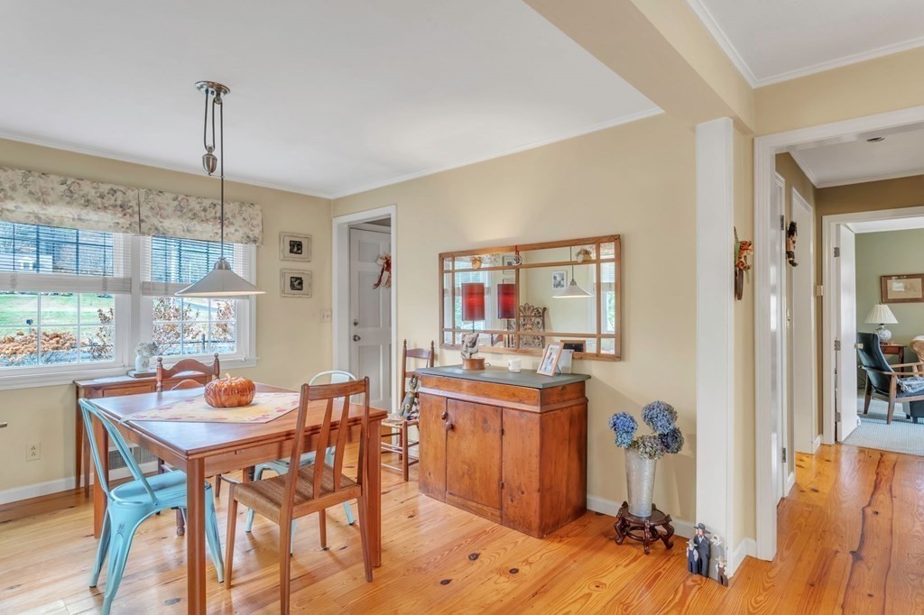 149 Boston Road Palmer, MA 01069 - Photo 13 of 35 a dining room with a table and chairs