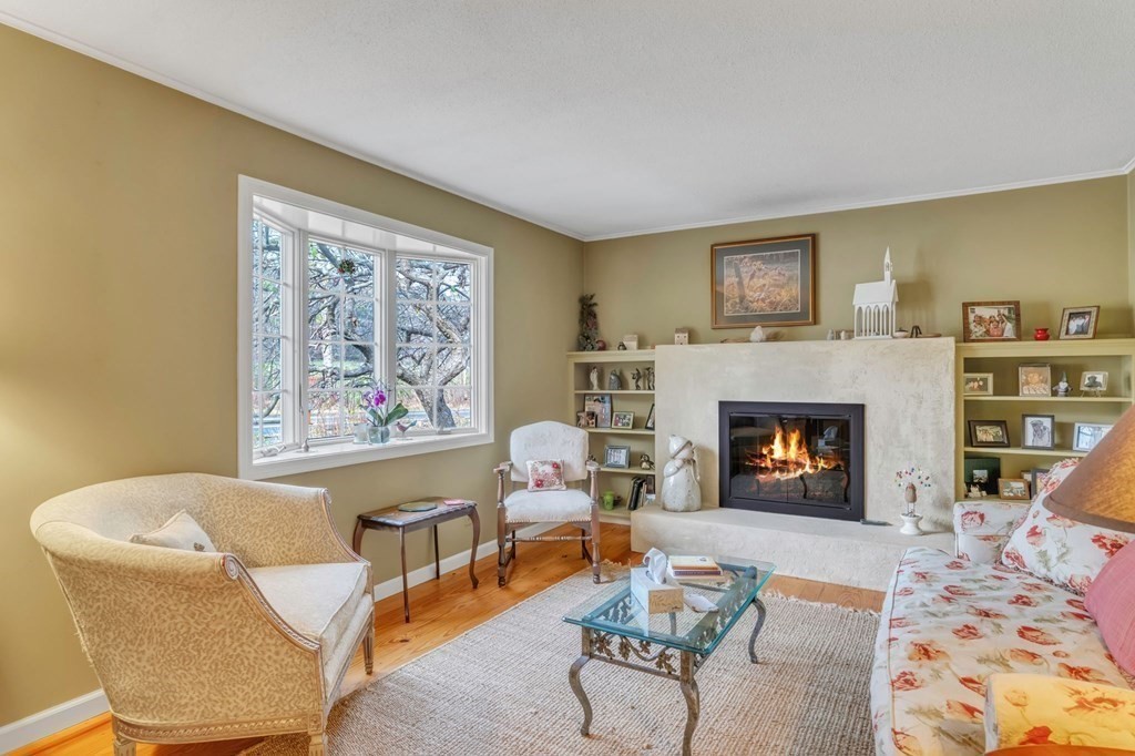 149 Boston Road Palmer, MA 01069 - Photo 15 of 35 a living room with furniture and a fireplace
