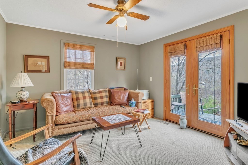 149 Boston Road Palmer, MA 01069 - Photo 18 of 35 a living room with furniture and a window