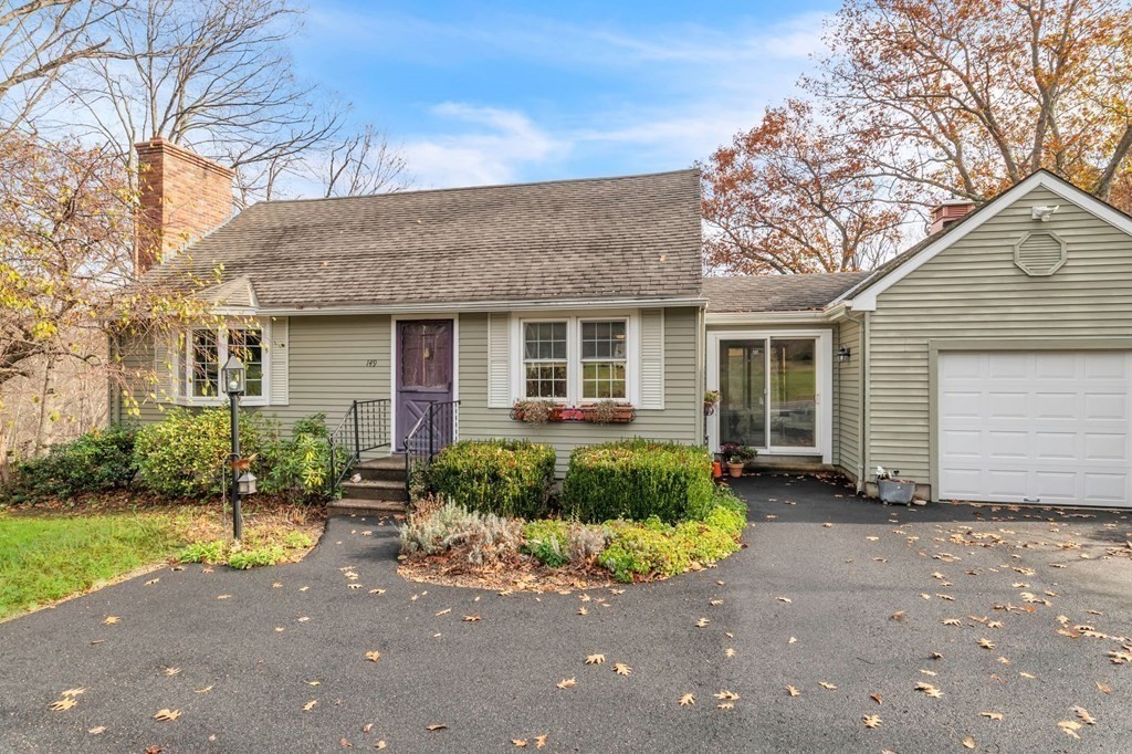149 Boston Road Palmer, MA 01069 - Photo 2 of 35 a front view of a house with garden