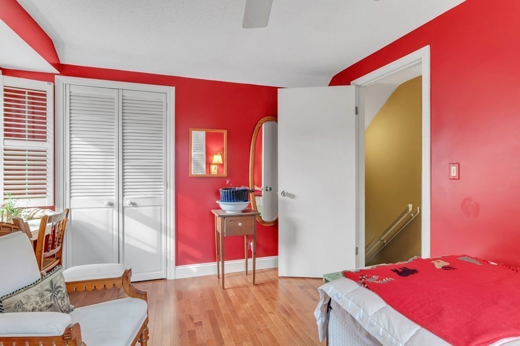 149 Boston Road Palmer, MA 01069 - Photo 26 of 35 a bedroom with a bed and wooden floor